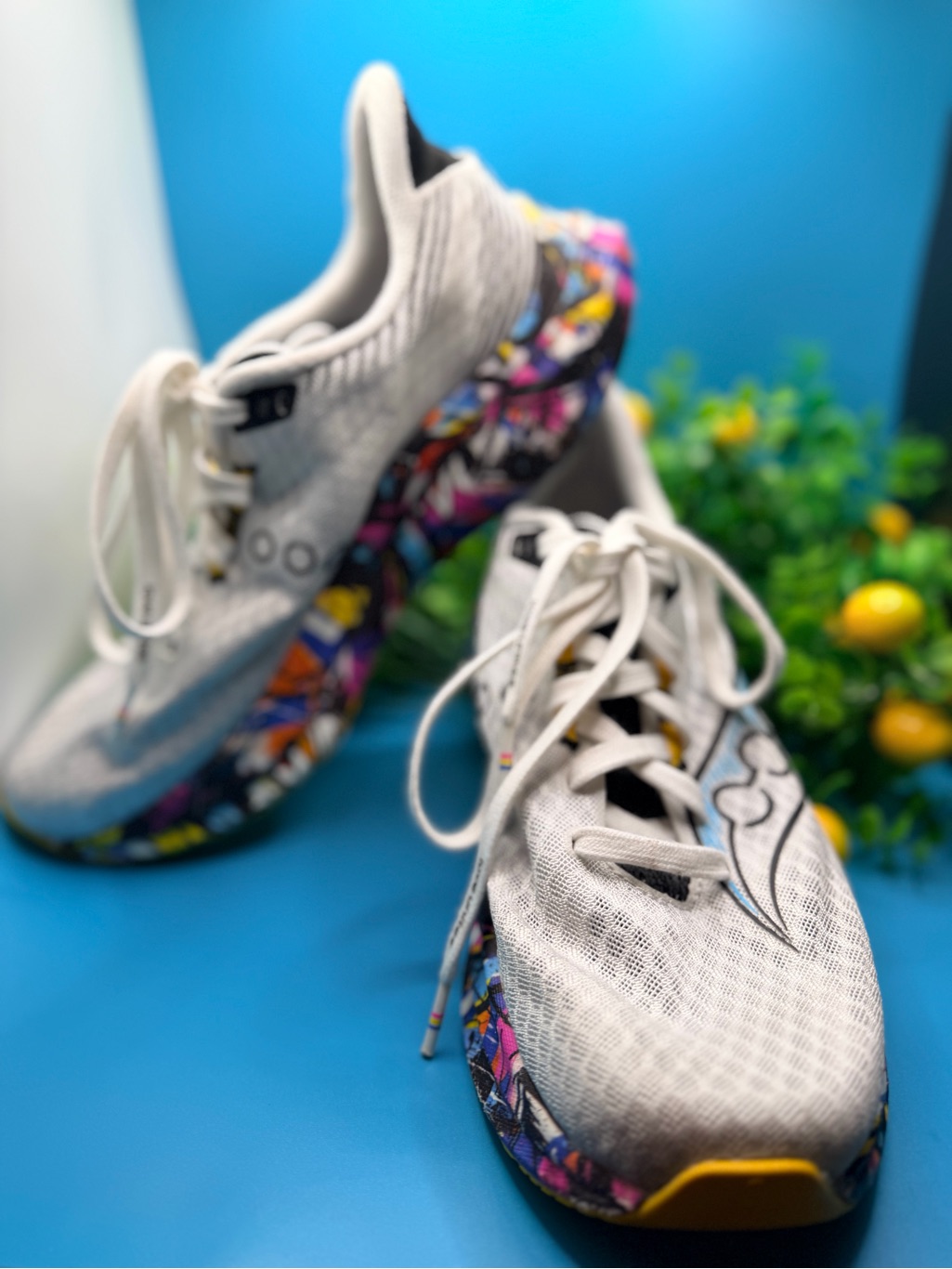 Saucony White Knit Athletic Sneakers With Multicolor Graphic Sole